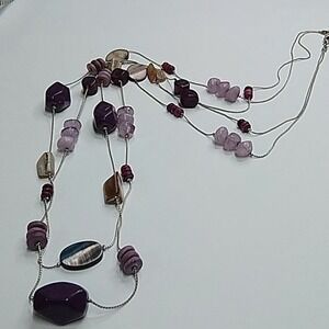 Double strand mother of pearl and purple‎ floating bead necklace